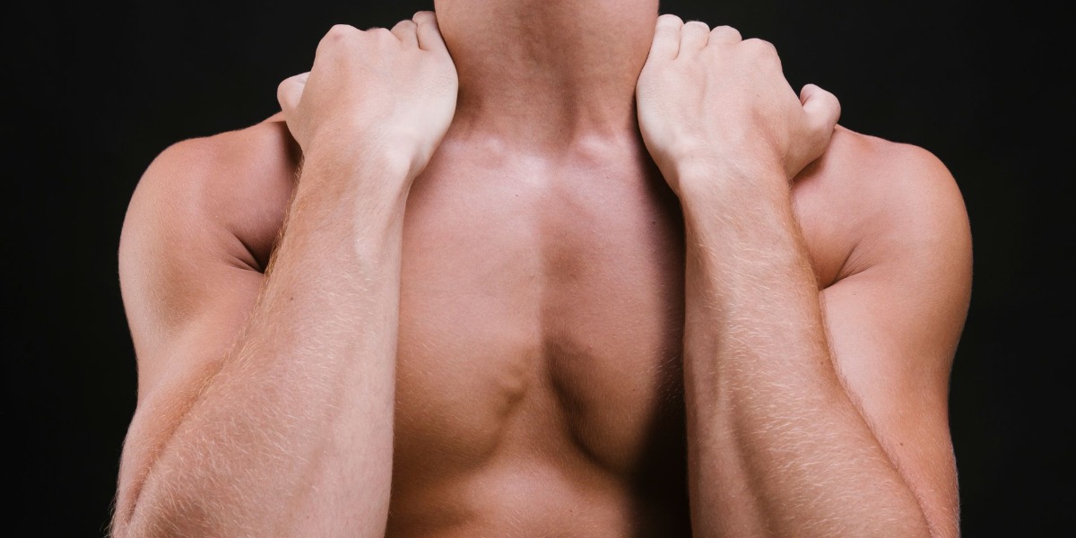 man-holding-his-shoulderas